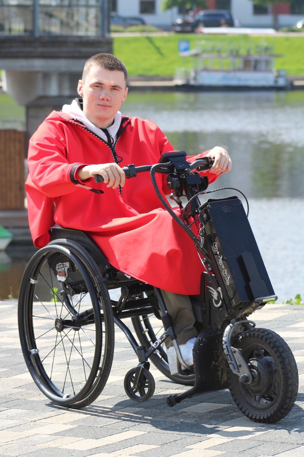 Atmungsaktiver Regenmantel für Rollstuhlfahrer