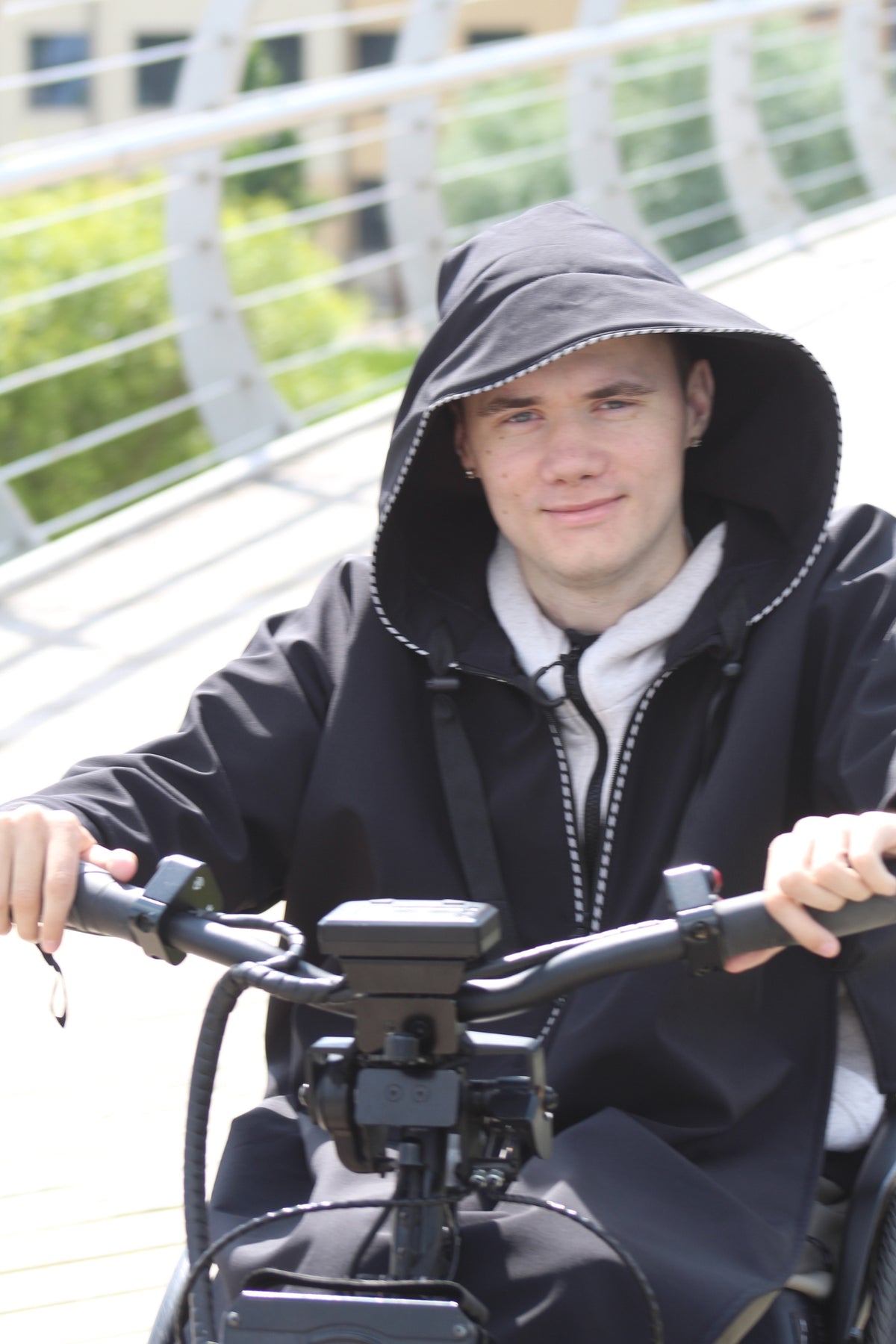 Atmungsaktiver Regenmantel für Rollstuhlfahrer