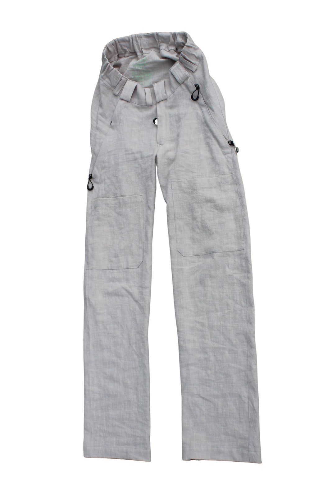 Vilber's men's summer trousers in beige ramie fabric, laid flat showing elasticated waistband and front opening.