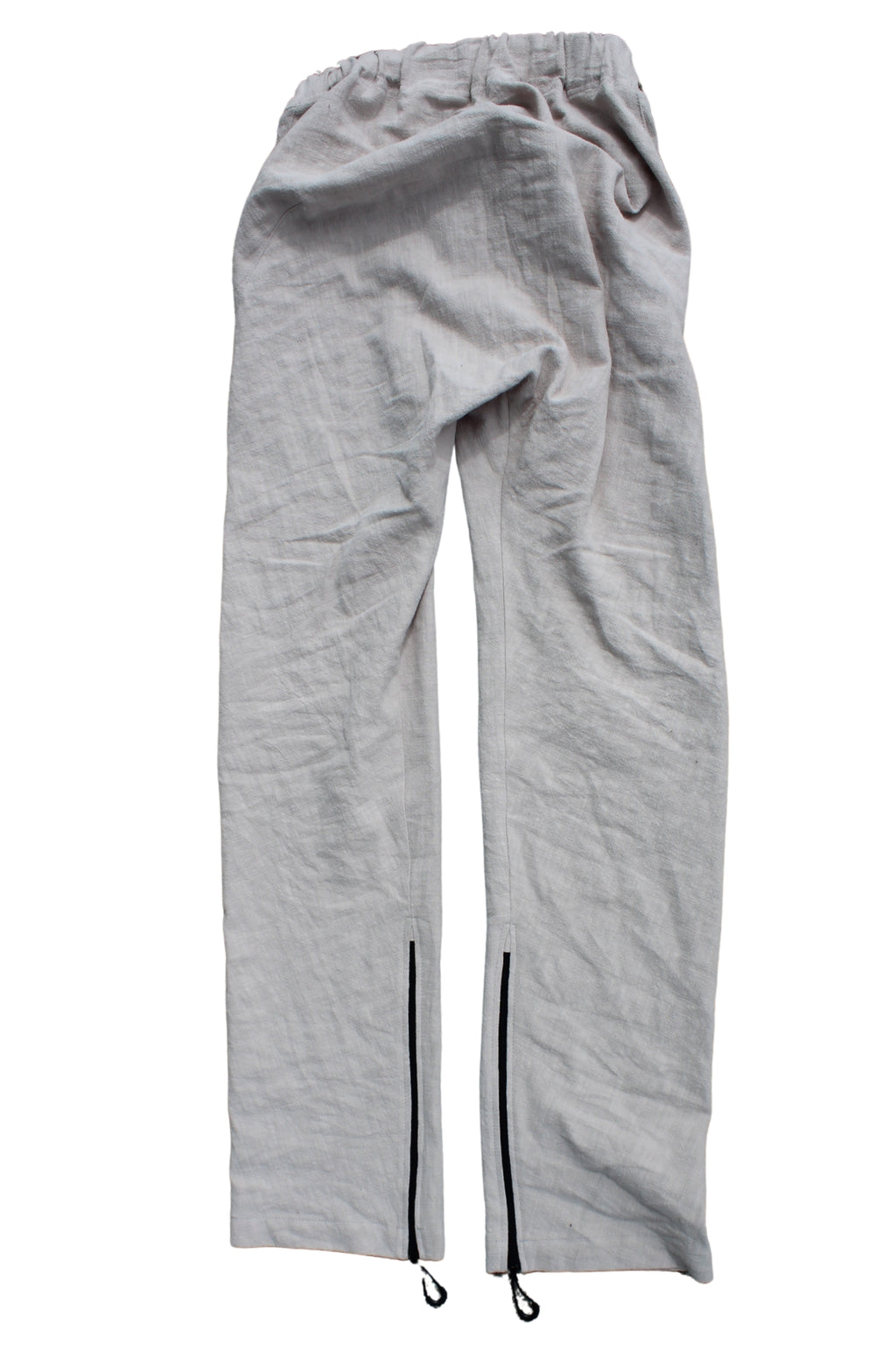 Back view of Vilber's adaptive summer trousers laid flat, showing the single-piece back panel with no centre seam.
