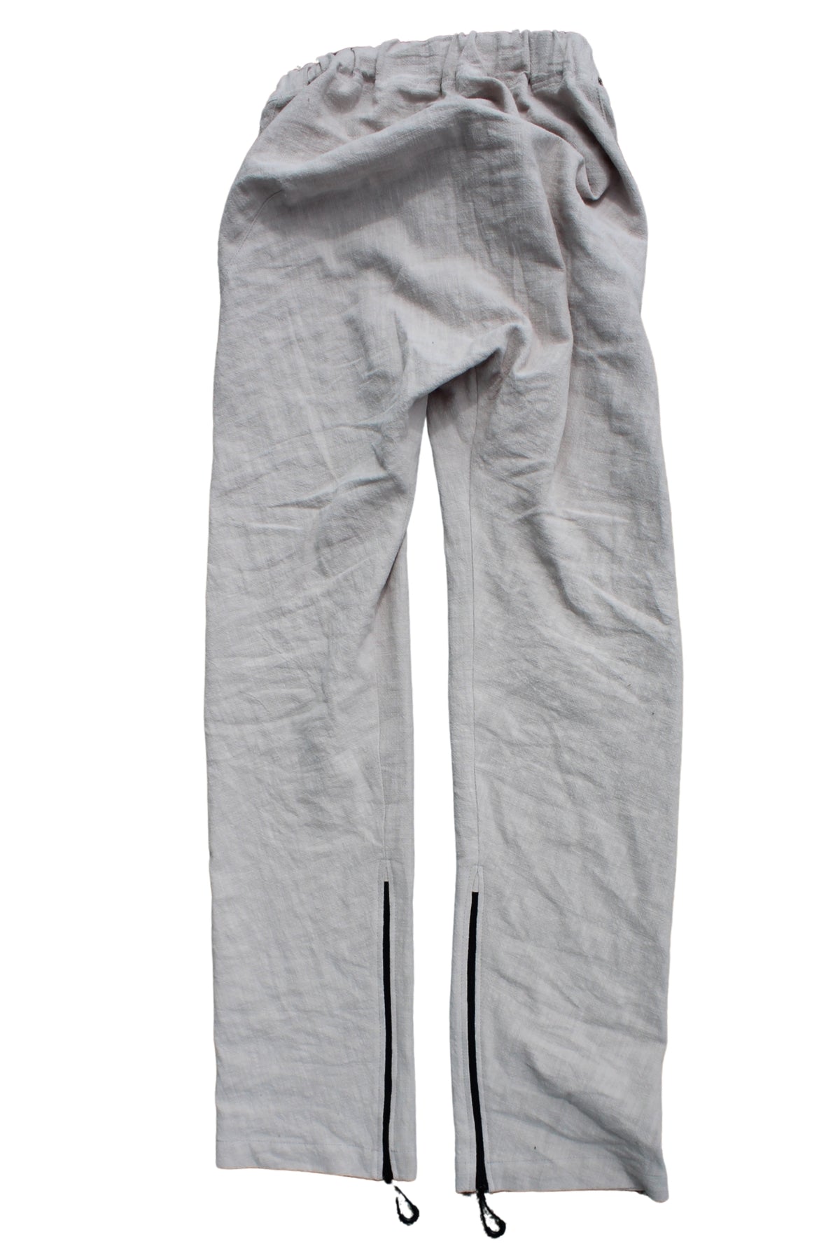 Back view of Vilber's adaptive summer trousers laid flat, showing the single-piece back panel with no centre seam.