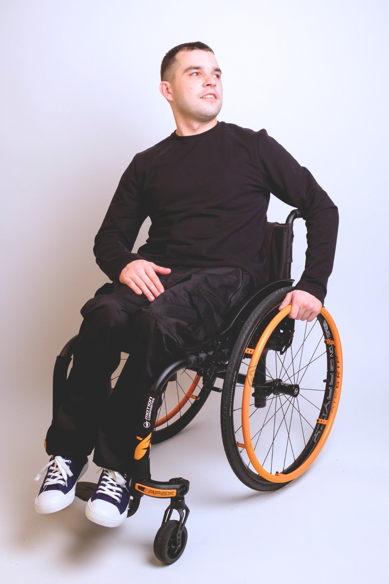 Black pants without pockets, wheelchair adapted