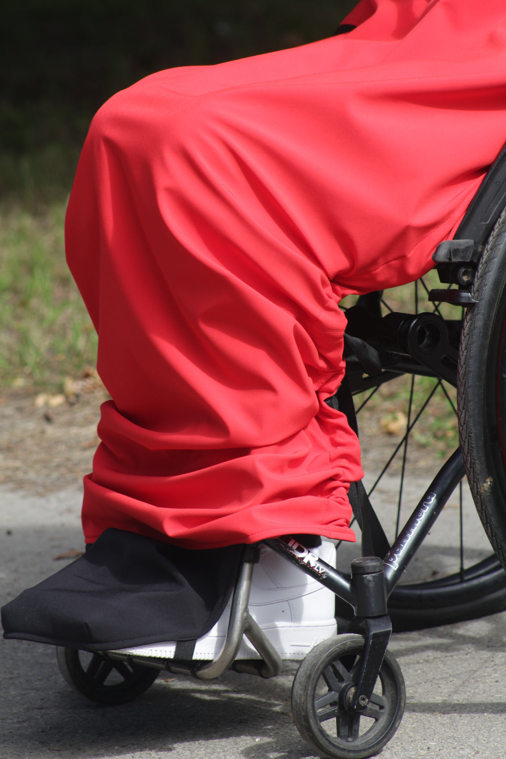 Atmungsaktiver Regenmantel für Rollstuhlfahrer