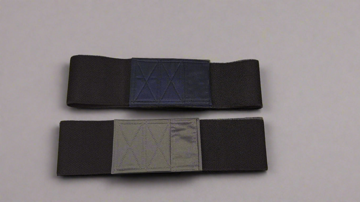 Wide elastic strap for keeping legs together for wheelchair users